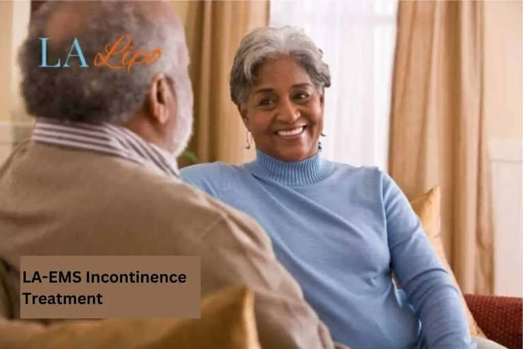 Couple sat smiling at each other - LA-EMS treatment Norwich