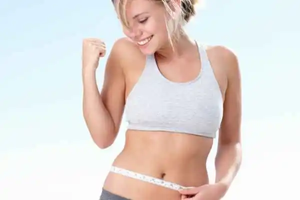 woman happy after fat reduction treatment Norwich