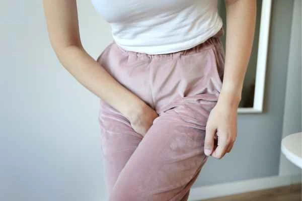 woman struggling with urine incontinence Norwich