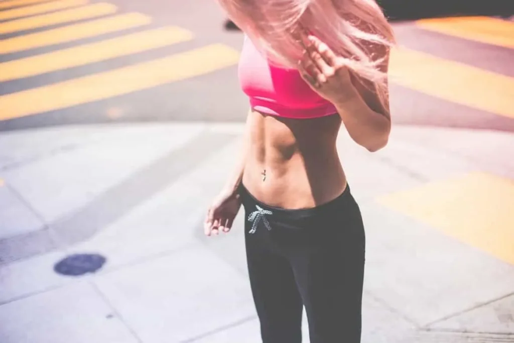 Woman with toned stomach after LA-EMS Body Sculpting Treatment Norwich
